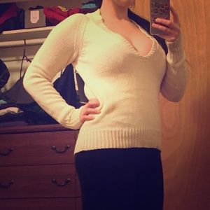 Cream colored sweater v-cut